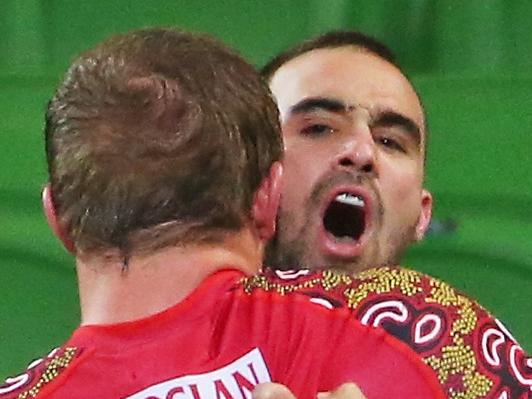 MELBOURNE, AUSTRALIA - JUNE 27: Nick Frisby of the Reds celebrates after scoring a try during the round 17 Super Rugby match between the Rebels and the Reds at AAMI Park on June 27, 2014 in Melbourne, Australia. (Photo by Scott Barbour/Getty Images)