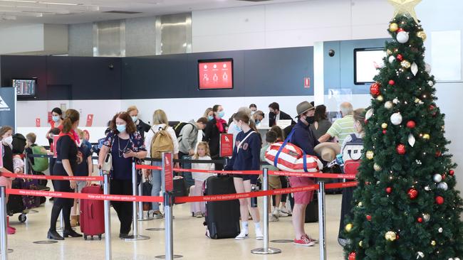 Passengers are advised to arrive two hours early for domestic flights. Picture: David Crosling