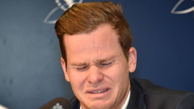 Cricketer Steve Smith breaks down in tears during a press conference at Sydney airport on March 29 after he was sent from South Africa is disgrace. His face, wracked in pain, sums up many people’s feelings about 2018. Picture: AFP/Peter Parks