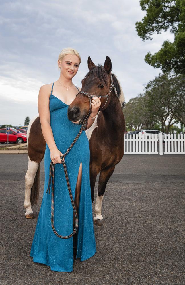 Graduate Caoilainn Finn with Murphy at The Industry School formal at Clifford Park Racecourse, Tuesday, November 12, 2024. Picture: Kevin Farmer