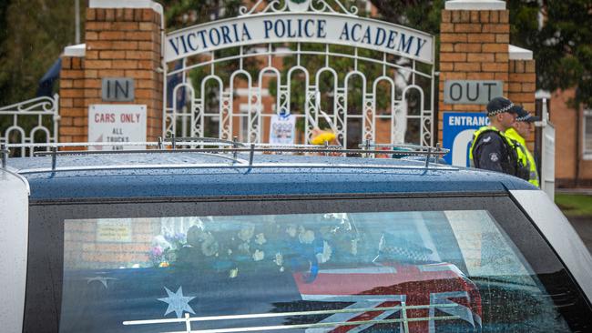 Victorian police officers escorted the body of Constable Glen Humphris to Albury. Picture: Jason Edwards