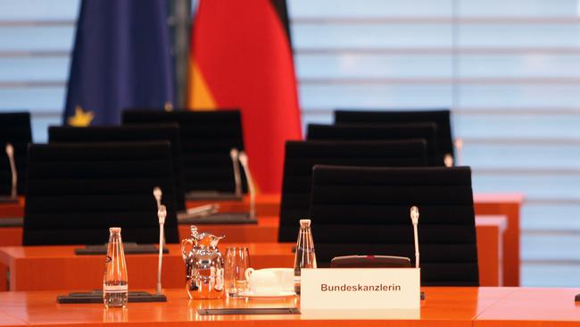 The empty seat of German Chancellor Angela Merkel at a weekly government cabinet meeting. Picture: Getty Images