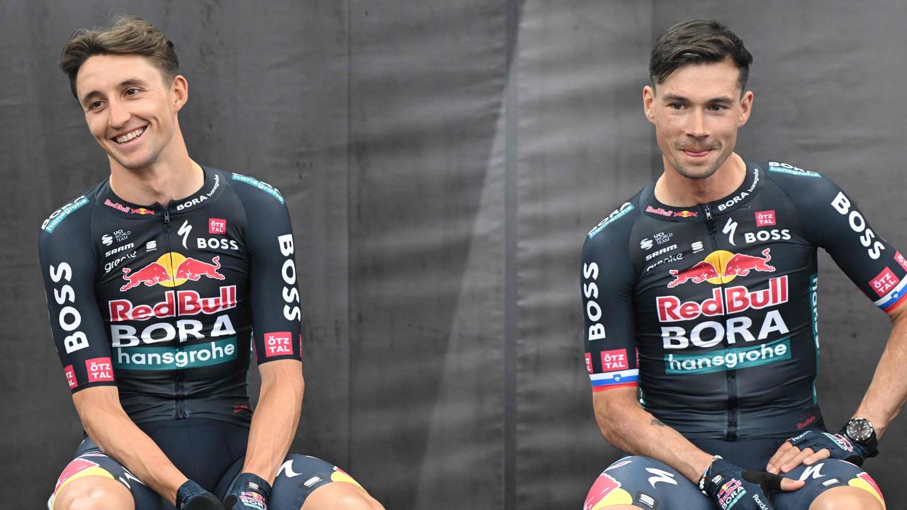 Australia’S Jai Hindley (left) and Slovenia's Primoz Roglic during the presentation of the new Red Bull-Bora-Hansgrohe cycling team. Picture: Kerstin Joensson / AFP