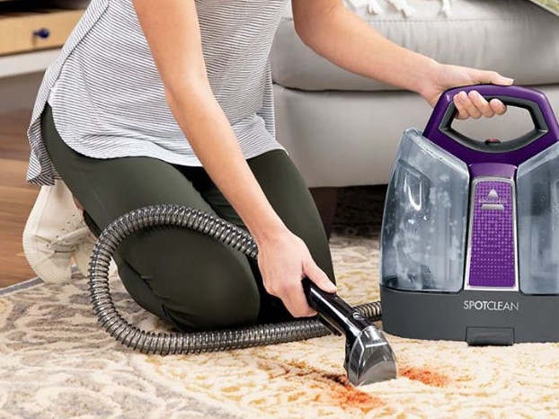 A portable carpet cleaner can banish all sorts of stains from your home. Image: Bissell.