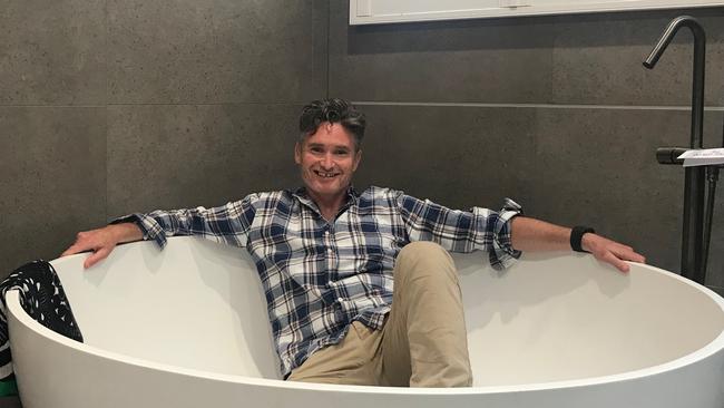 Dave Hughes tries out his new bath tub.