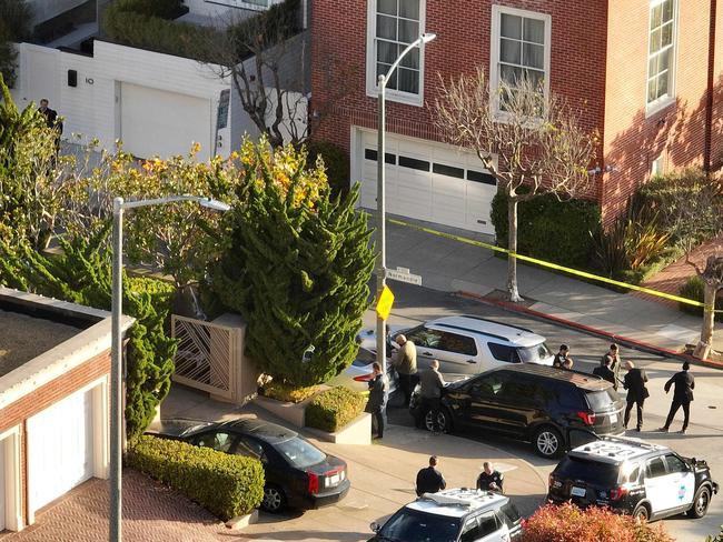 Police officers and FBI agents gather in front of the home of US Speaker of the House Nancy Pelosi in San Francisco, California. Picture: Getty Images/AFP