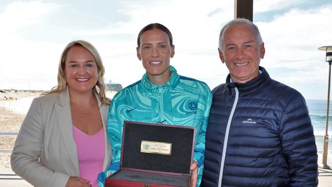 Emily van Egmond getting the keys to the city of Newcastle with dad Gary.