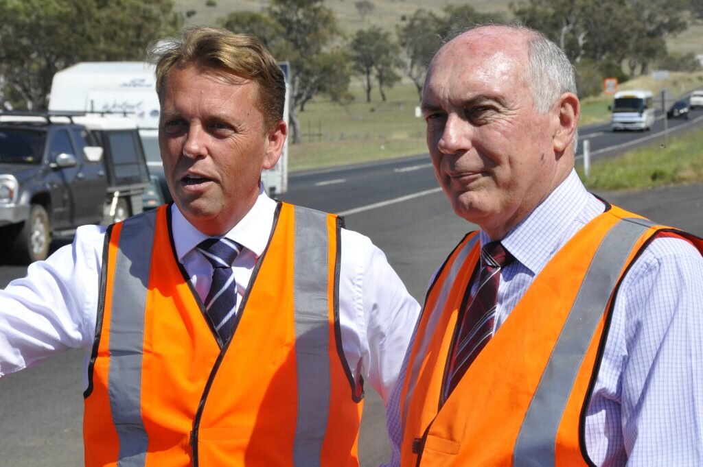 The former (now shadow) Queensland Minister for Transport and Main Roads Scott Emerson and Minister for Infrastructure and Regional Development Warren Truss met at the start of the works last year. Picture: Andrew Backhouse