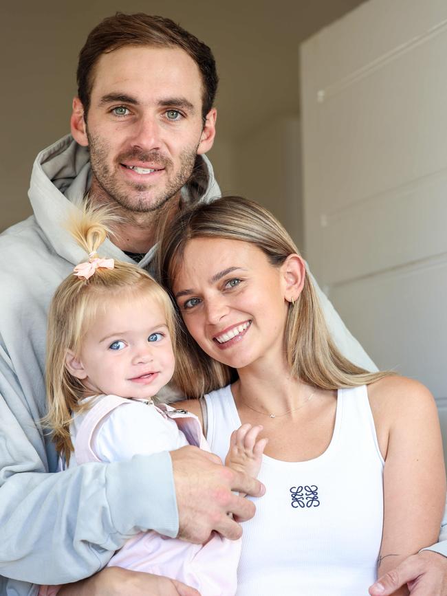 Kellie Finlayson with her husband Jeremy and daughter Sophia. Picture: Russell Millard