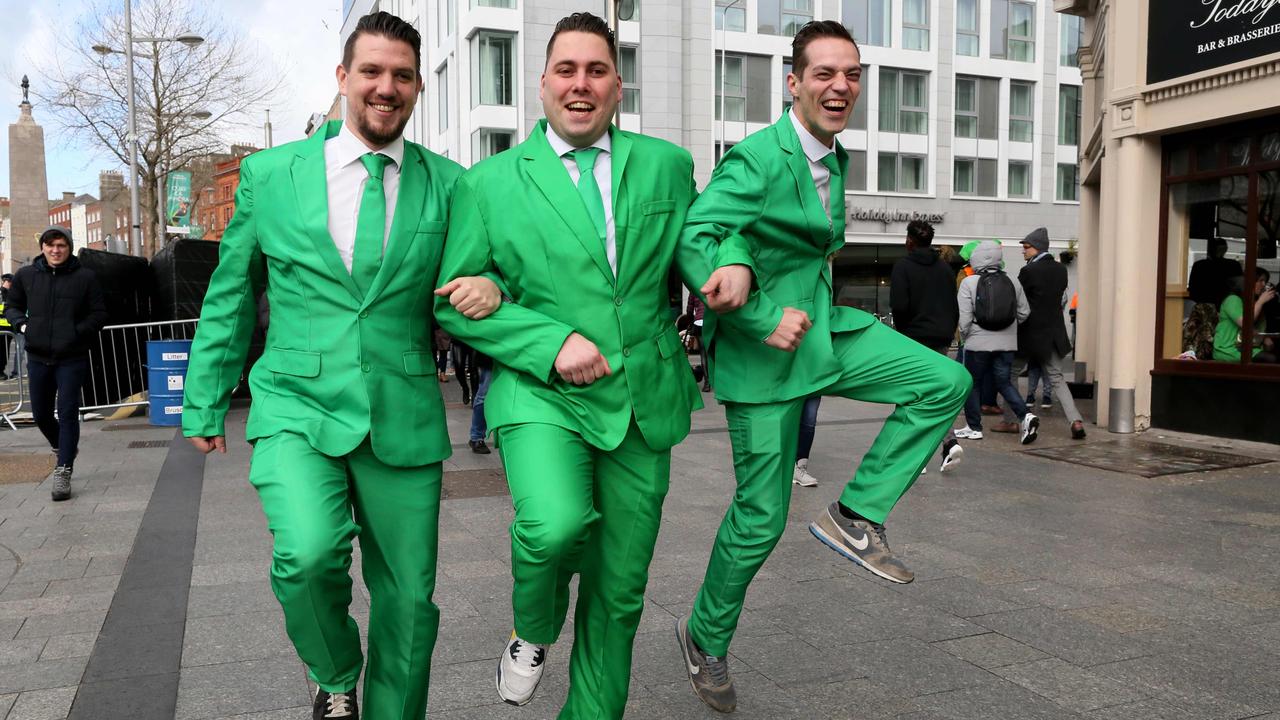 Spectators line the route during the annual St Patrick’s Day parade through the city centre of Dublin in 2019. Picture: Paul Faith