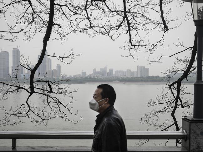 WUHAN, CHINA - APRIL 21:CHINA OUTA residents walk nearby the Yangtze River on April 21, 2020 in Wuhan, Hubei Province, China. The government started lifting outbound travel restrictions on April 8 from Wednesday after almost 11 weeks of lockdown to stem the spread of COVID-19. (Photo by Getty Images)