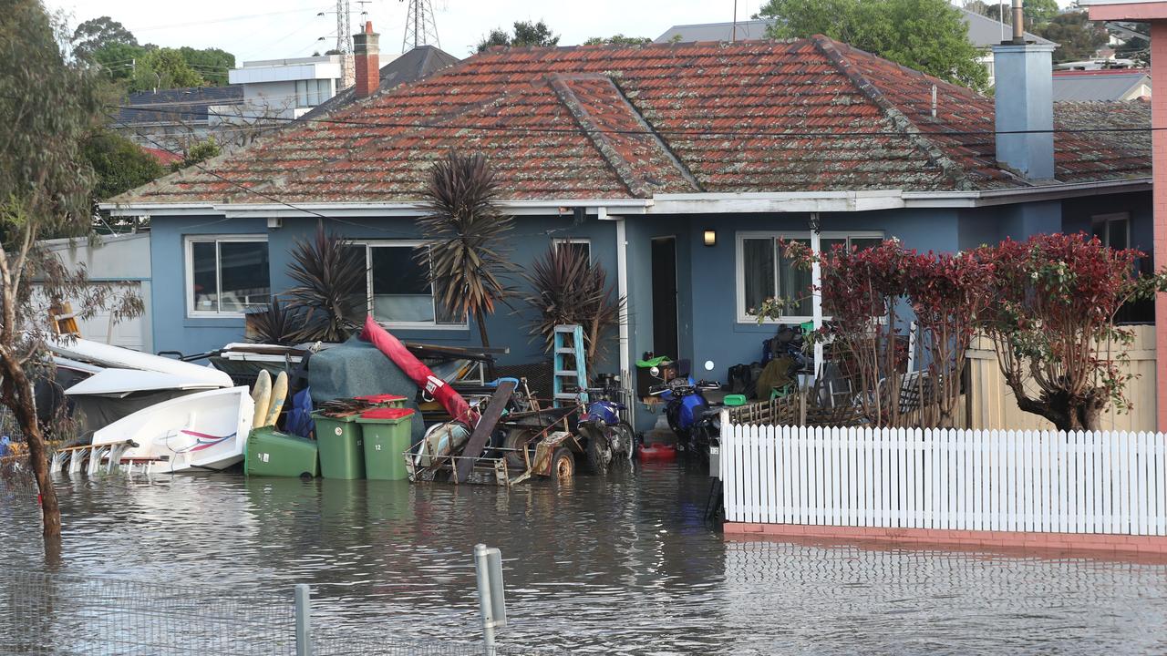 Homes in Anglers Way are under threat from rising floodwaters. Picture: David Crosling