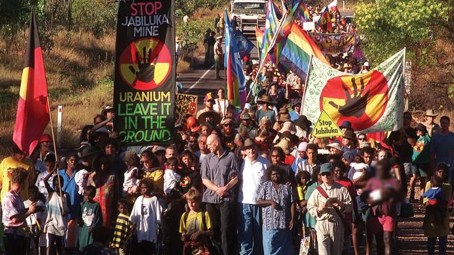 In 1998 more than 5000 people including Peter Garrett joined with Mirarr Traditional Owners to block the Jabiluka mine, owned by Energy Resources of Australia.