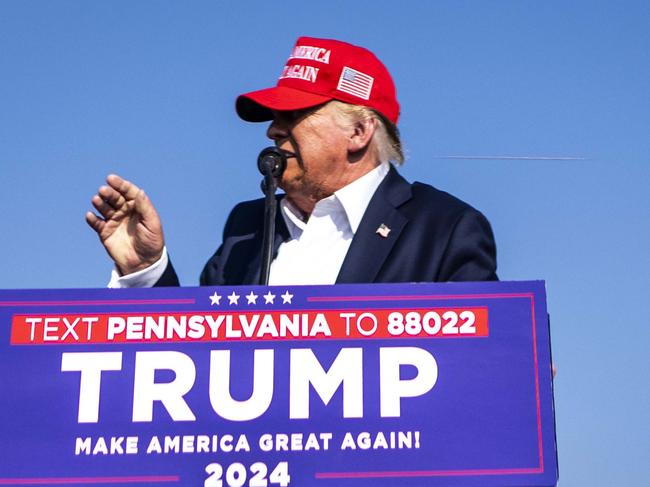 This photo captured the moment the bullet flew past Donald Trump’s head. Picture: Doug Mills/New York Times/Headpress