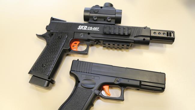 Pictured is a Gel Blaster replica of a 1911 Race Gun (top) and a Gel Blaster replica Glock. PHOTO: Bronwyn Wheatcroft