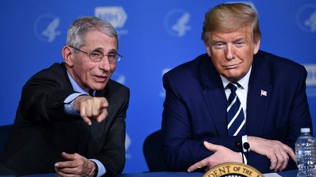 Anthony Fauci, director of the NIH National Institute of Allergy and Infectious Diseases and then US President Donald Trump in 2020, following up on the Covid-19, coronavirus outbreak. Picture: Brendan Smialowski/AFP