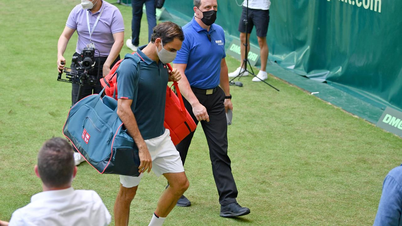 Roger Federer’s Wimbledon preparation his a snag. (Photo by Thomas F. Starke/Getty Images)