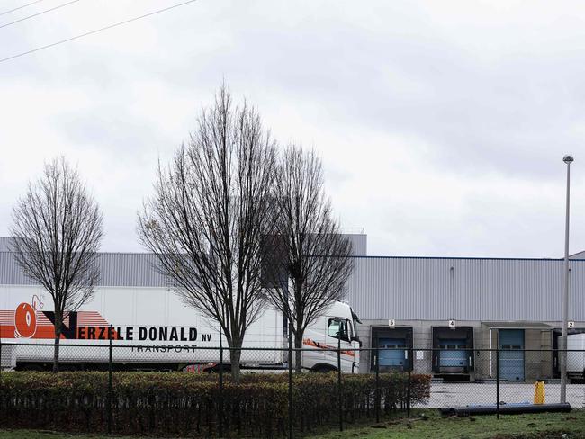 Trucks are loaded at a factory of US multinational pharmaceutical company Pfizer, in Puurs, where COVID-19 vaccines are being produced for Britain. Picture: AFP