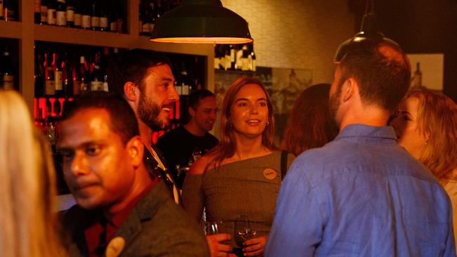 Attendees mingling at the Wine Library. Picture: Max Mason-Hubers