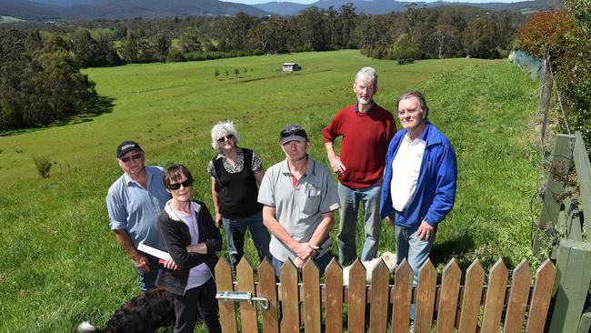 Yarra Valley residents (from left) Leo Boxell, Jenny Barber, Bev Boxell, Ian Barber, Rick Houlihan and Paul Bruton are is concerned removing grazing rights will increase the risk of bush fires. Picture: Steve Tanner