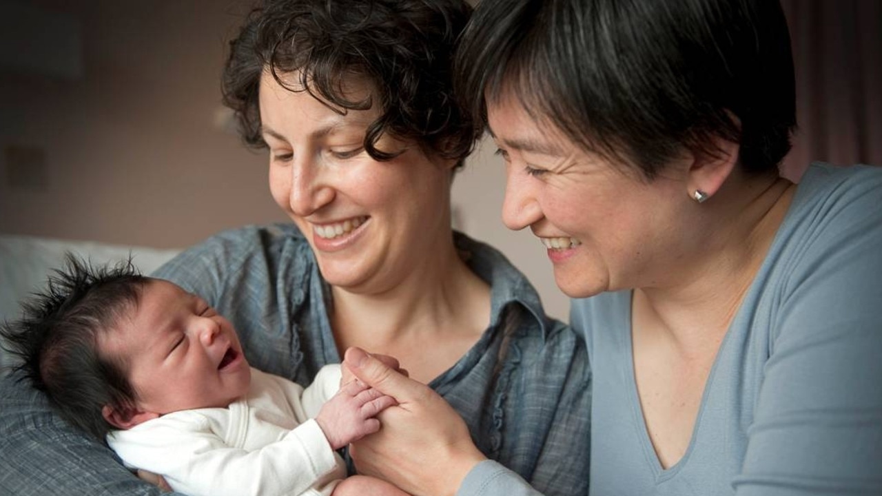 Penny Wong with partner Sophie Allouache and their baby daughter Alexandra. Picture: AAP Image/David Mariuz