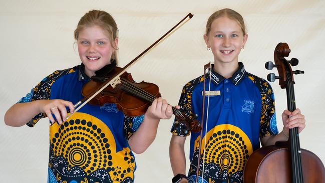 Molly Cork and Tully Bell from One Mile State School prepare for the small instrumental ensembal strings (primary school) at the Gympie Eisteddfod. August 1, 2023. Picture: Christine Schindler