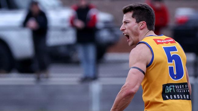 Anthony Doherty celebrates one of his three goals against North Heidelberg for Macleod. Picture: George Salpigtidis.