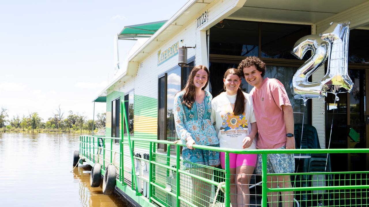 Trinity Williams, 21, from Waikerie with best friends Alicia Shaw, 22, and Brendan Wilson, 26, from Mount Barker on a Green &amp; Gold Houseboat to celebrate her 21st birthday. Picture: Morgan Sette