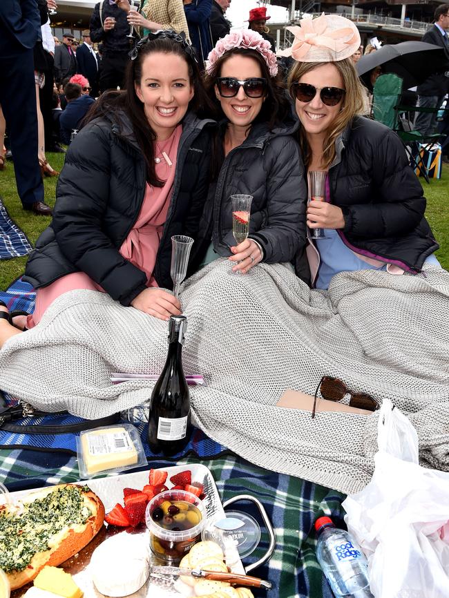 All rugged up: Jenna Smyth, Daniella Holschier and Jacqui Morey. Picture: Nicole Garmston