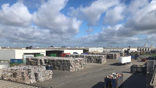 Stockpiles of waste at the Laverton North recycling plant.