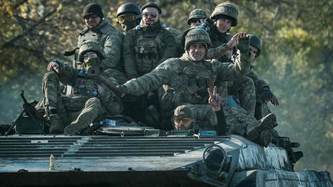 Ukrainian soldiers on an armoured vehicle in the Kharkiv region. Picture: AFP