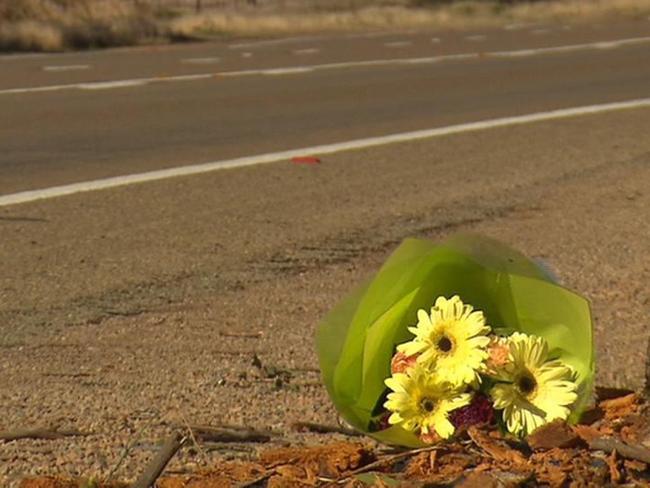 A son and grandmother have been killed in a horror crash at Baroota. Flowers were left at the scene. Picture: 7 News