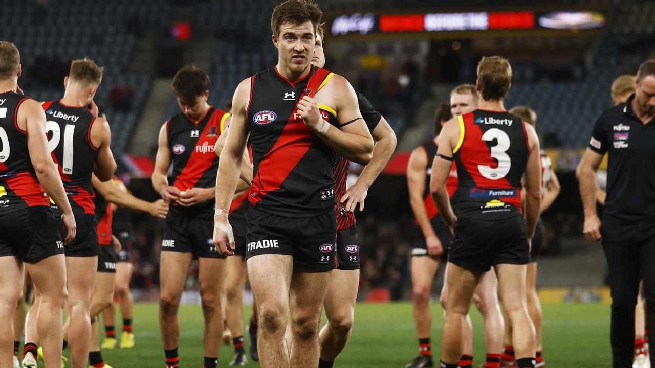 MELBOURNE, AUSTRALIA - AUGUST 14: Zach Merrett of the Bombers looks dejected after the round 22 AFL match between the Essendon Bombers and the Port Adelaide Power at Marvel Stadium on August 14, 2022 in Melbourne, Australia. (Photo by Daniel Pockett/Getty Images)