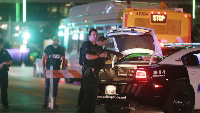 The horror of the Dallas police shooting was on everyone’s mind when a man turned up at a New York restaurant with a gun. Picture: Mark Mulligan/Houston Chronicle via AP