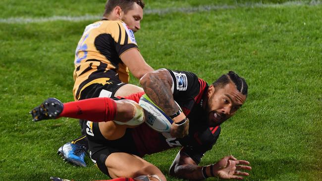 Digby Ioane of the Crusaders dives over to score a try.