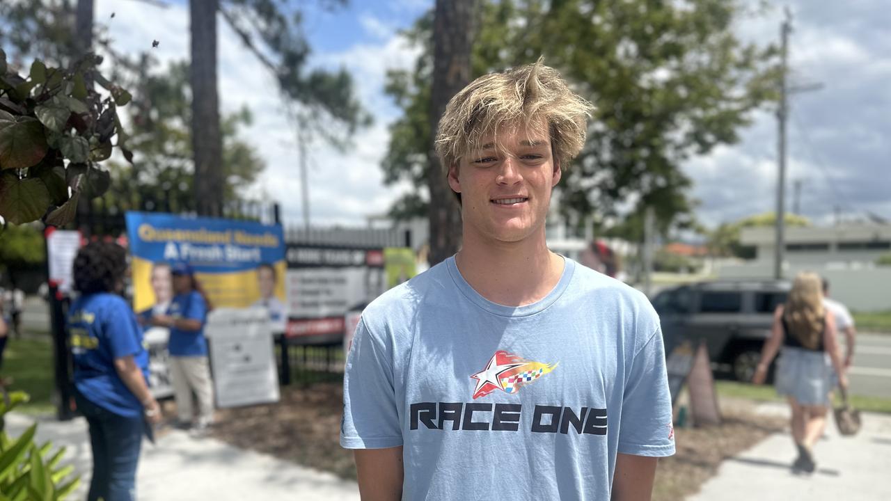 Palm Beach voter Ethan Callaghan putting pen to paper for the Queensland state election. “I’m looking to buy a house and (LNP Burleigh candidate) Hermann Vorster said he could help me - so I voted for him.” Picture: Ashleigh Jansen