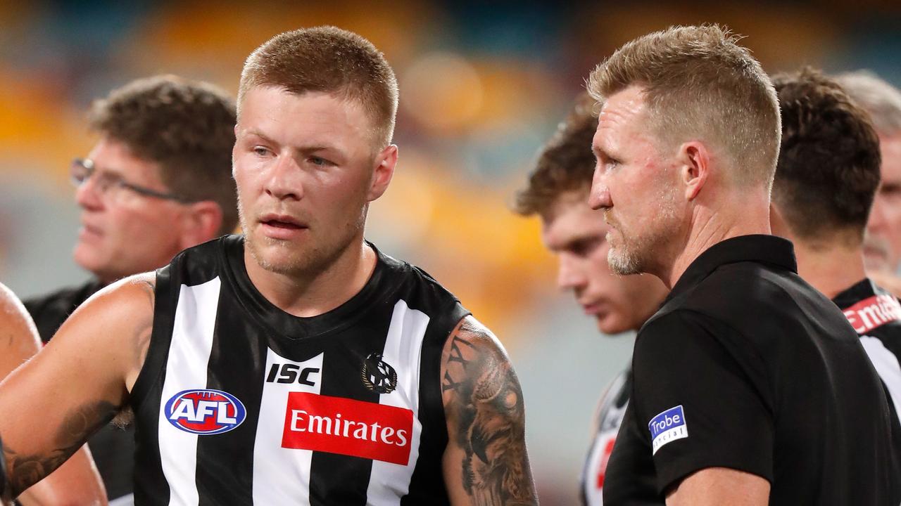 BRISBANE, AUSTRALIA - SEPTEMBER 21: Jordan De Goey of the Magpies and Nathan Buckley, Senior Coach of the Magpies are seen during the 2020 AFL Round 18 match between the Collingwood Magpies and the Port Adelaide Power at The Gabba on September 21, 2020 in Brisbane, Australia. (Photo by Michael Willson/AFL Photos via Getty Images)