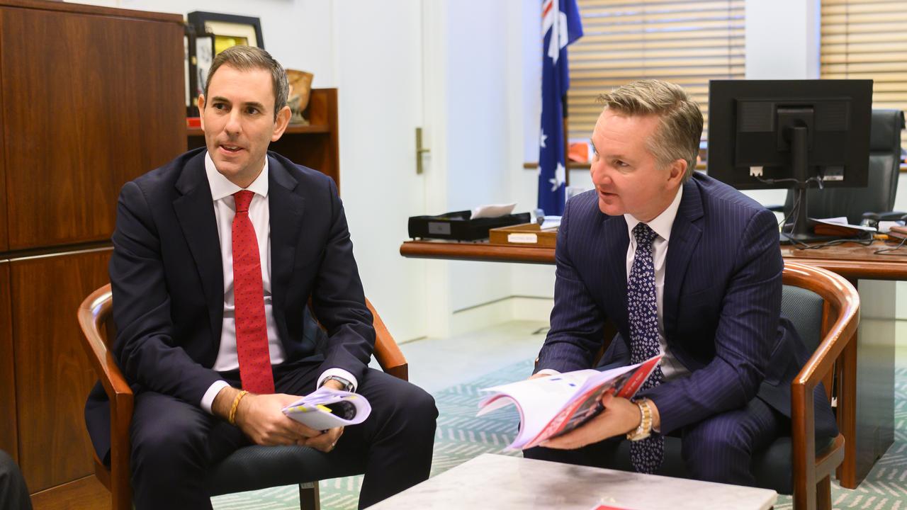 Shadow treasurer Chris Bowen (right) and Shadow Minister for Finance Jim Chalmers talk with the costings panel in Chris Bowen's office ahead. Picture: Rohan Thomson/AAP