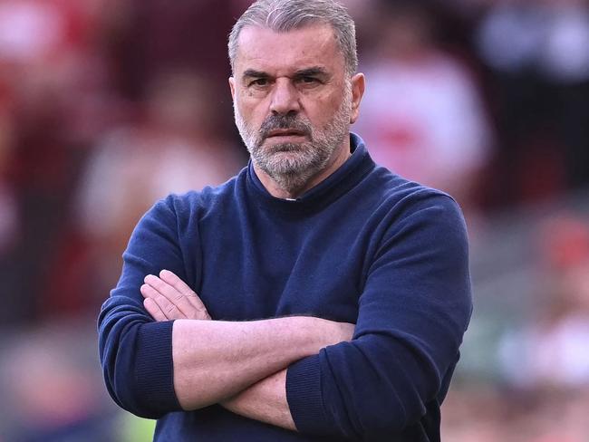 Tottenham Hotspur's Greek-Australian Head Coach Ange Postecoglou looks on during the English Premier League football match between Liverpool and Tottenham Hotspur at Anfield in Liverpool, north west England on April 27, 2025. (Photo by Paul ELLIS / AFP) / RESTRICTED TO EDITORIAL USE. No use with unauthorized audio, video, data, fixture lists, club/league logos or 'live' services. Online in-match use limited to 120 images. An additional 40 images may be used in extra time. No video emulation. Social media in-match use limited to 120 images. An additional 40 images may be used in extra time. No use in betting publications, games or single club/league/player publications. /