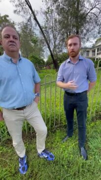 Arundel community leader Jason Young with Division 7 council candidate Joe Wilkinson checking on tree damage around homes overlooking the rundown Country Club course.