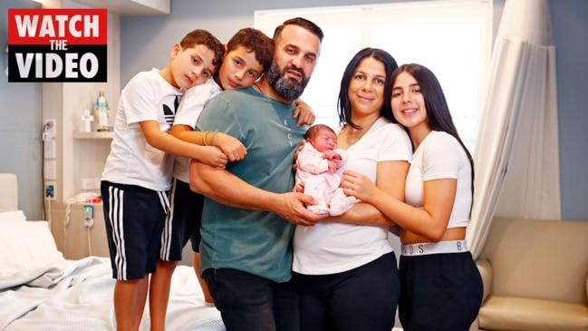 Surviving Abdallah siblings meet new baby sister