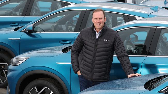 Mark Harland, chief operating officer of BYD distributor EV Direct, with hundreds of electric cars. Picture: Alex Coppel.