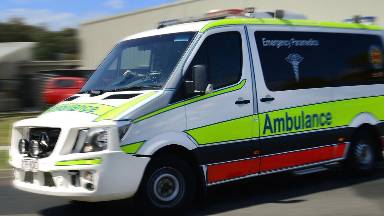 Car rolls in three-car crash near shopping centre