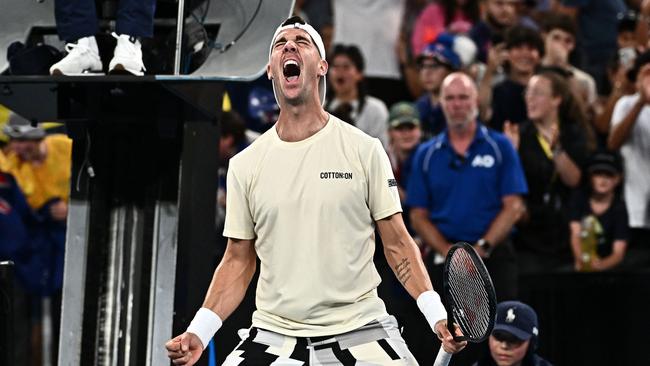 Thanasi Kokkinakis celebrates after victory against Austria's Sebastian Ofner. Picture: Lillian Suwanrumpha / AFP