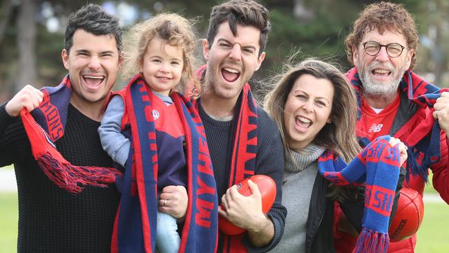 Melbourne fans Michael Lipson holding Asher Lipson, Daniel Roth, Romy Lipson and Joseph Roth. Picture: Alex Coppel