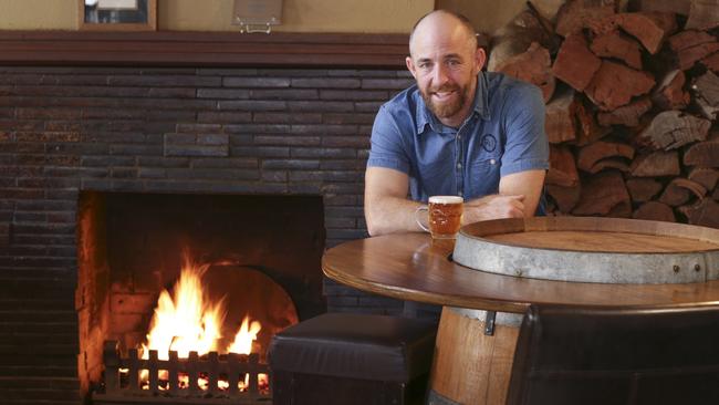 Open fireplaces make winter more tolerable in Melbourne. The fireplace at Railway Hotel in South Melbourne. Picture by Wayne Taylor.