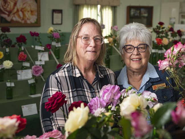 Melissa Redmond (left) and Bonita Cattell at the Queensland Rose Society Darling Downs Group autumn show, Saturday, May 4, 2024. Picture: Kevin Farmer