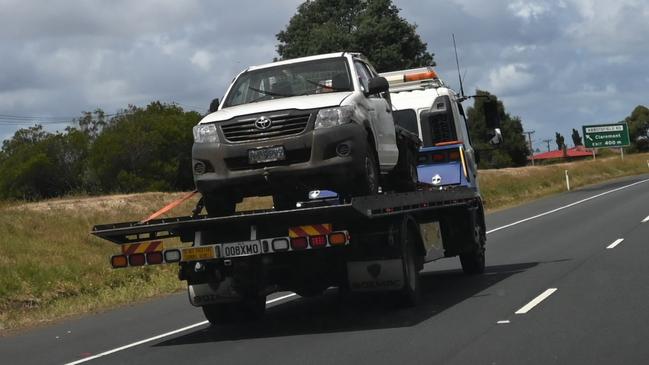 A tow truck removes a vehicle from a crash on the Brooker Highway near Granton.