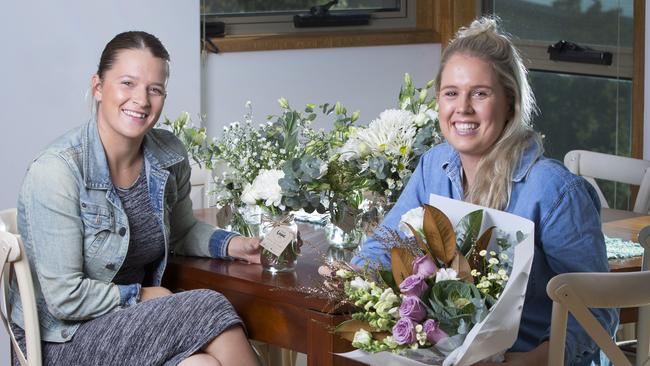 Gold Coast florist Chandler Searle and Riley Maynard from Posy Lane Co. Picture: NIGEL HALLETT