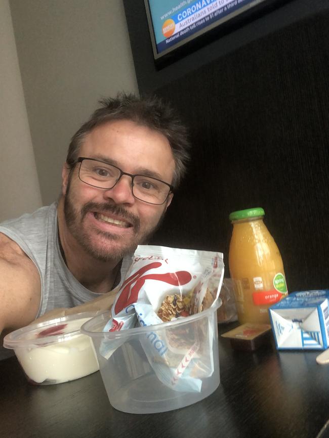Anthony Keane shows off his breakfast.